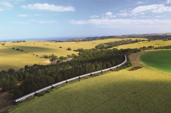 Luxury Rovos Rail train travelling through the South African countryside.